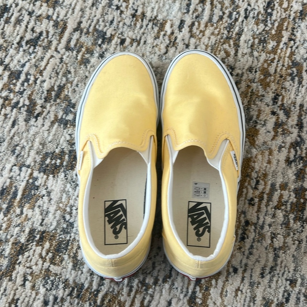 Yellow vans never worn. Paid 30 for them asking 15